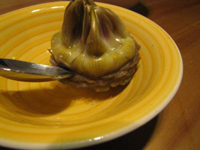 clean off the artichoke heart with a spoon