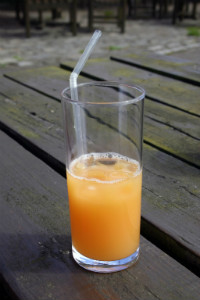 Mix orange juice with carbonated water