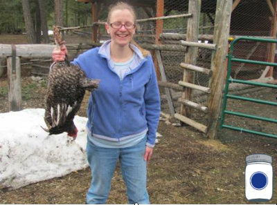 Chaya holding a chicken