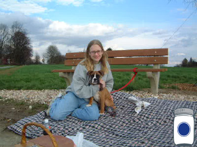 Chaya with a puppy on a picnic