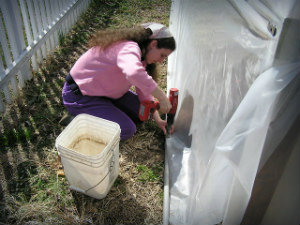 Kara fixing the greenhouse